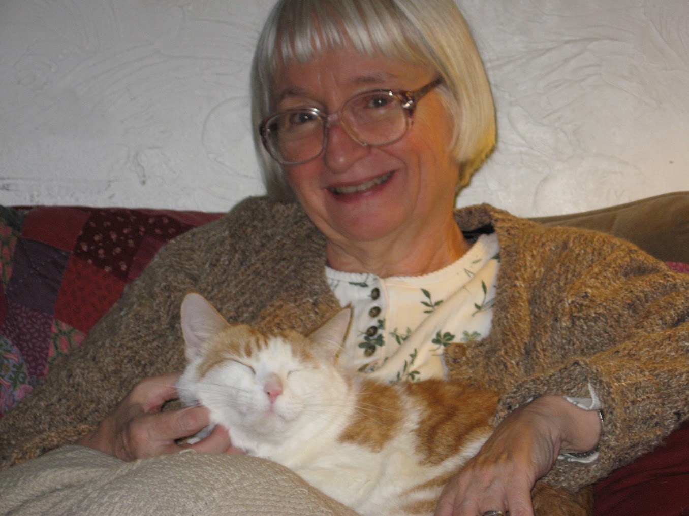 Nancy Maddock with the family - Bob, Geoff, Ellen, cats George and Samantha